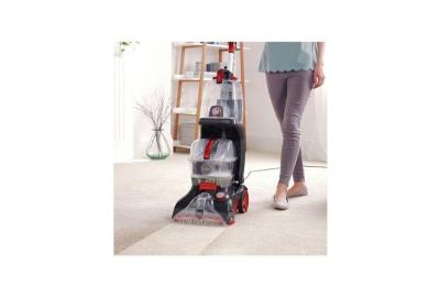 VAX Rapid Power Pro Upright carpet upholstery washer and cleaner being used on a thick carpet