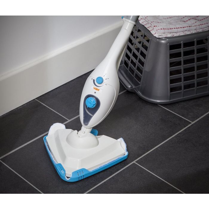 A Vax powermax upright steam mop stick cleaner in action on a tiled floor 
